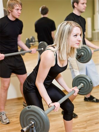 simsearch:400-04148009,k - Girl lifting weights at the gym Photographie de stock - Aubaine LD & Abonnement, Code: 400-04149240