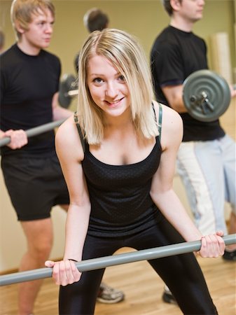 simsearch:400-04148009,k - Girl lifting weights at the gym Photographie de stock - Aubaine LD & Abonnement, Code: 400-04149241