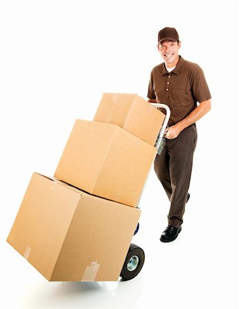 dolly - Friendly delivery man or mover pushes a stack of boxes on a hand truck.  Full body isolated. Stock Photo - Budget Royalty-Free & Subscription, Code: 400-04149766