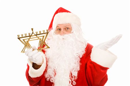 simsearch:400-06462885,k - Santa Claus holding a Jewish menorah and looking confused.  Isolated on white. Stock Photo - Budget Royalty-Free & Subscription, Code: 400-04149810