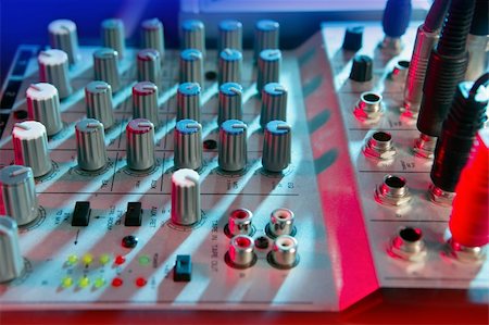 simsearch:400-04630784,k - Audio mixer music desk under colorful lights equipment Stock Photo - Budget Royalty-Free & Subscription, Code: 400-04140571