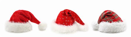 simsearch:400-08491819,k - Chapeaux de père Noël isolé sur fond blanc Photographie de stock - Aubaine LD & Abonnement, Code: 400-04141216