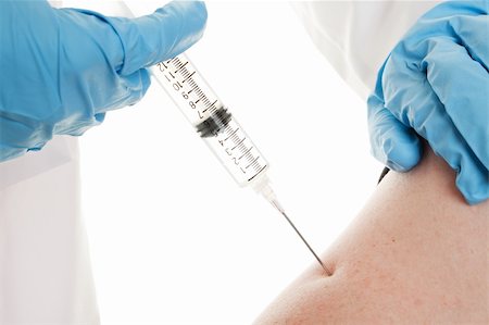 An H1N1 Influenza shot being injected into an arm. Stock Photo - Budget Royalty-Free & Subscription, Code: 400-04155591