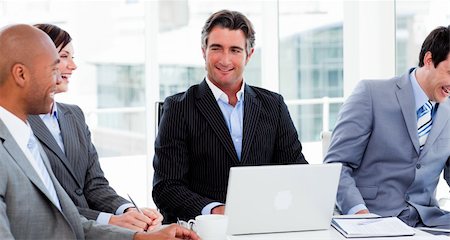 Confident manager in a meeting with his team Stock Photo - Budget Royalty-Free & Subscription, Code: 400-04157261