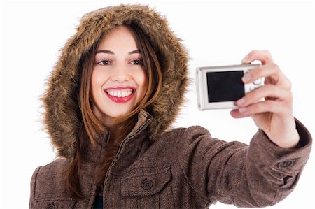 simsearch:400-04158321,k - Women taking pic of herself with camera on a white background Stock Photo - Budget Royalty-Free & Subscription, Code: 400-04158302