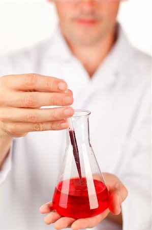 simsearch:649-07279795,k - Close-up of a test-tube with blood hold by a scientist Stock Photo - Budget Royalty-Free & Subscription, Code: 400-04150627