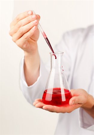 simsearch:649-07279795,k - Four laboratory retorts isolated on a table Stock Photo - Budget Royalty-Free & Subscription, Code: 400-04150630