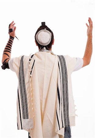 Rear view of jewish men put phylactery on isolated background Stock Photo - Budget Royalty-Free & Subscription, Code: 400-04152430