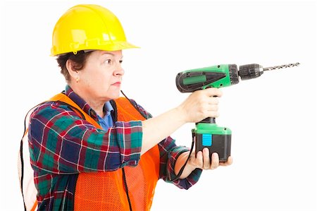 plumber (female) - Female construction worker holding a power drill.  Isolated on white. Stock Photo - Budget Royalty-Free & Subscription, Code: 400-04153220