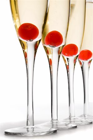 spanishalex (artist) - Line of cherry champagne cocktails over white Stock Photo - Budget Royalty-Free & Subscription, Code: 400-04153814