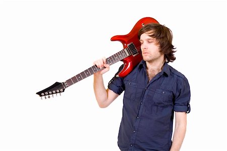 simsearch:400-04863651,k - guitarist with his guitar on shoulder over white background Stock Photo - Budget Royalty-Free & Subscription, Code: 400-04165963