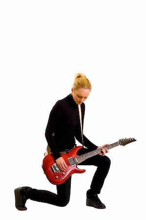 simsearch:400-04863651,k - picture of a young girl playing an electric guitar Stock Photo - Budget Royalty-Free & Subscription, Code: 400-04165979