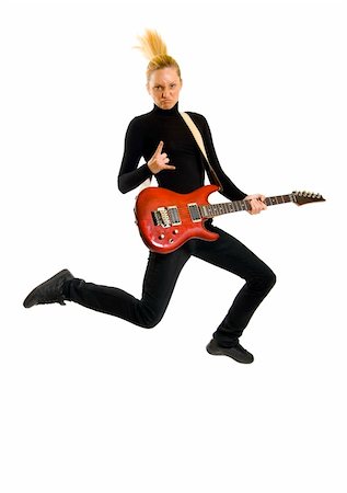 simsearch:400-04652753,k - headbanging woman guitarist jumps making rock sign over white Stock Photo - Budget Royalty-Free & Subscription, Code: 400-04165984
