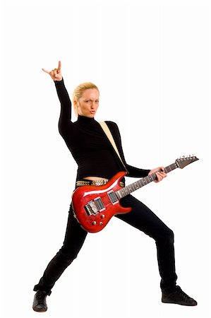 simsearch:400-04652753,k - passionate woman guitarist playing the guitar and making a rock sign Stock Photo - Budget Royalty-Free & Subscription, Code: 400-04165980