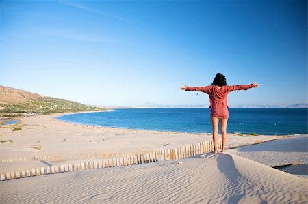 woman at sand dune in spain with african horizon Stock Photo - Budget Royalty-Free & Subscription, Code: 400-04166962