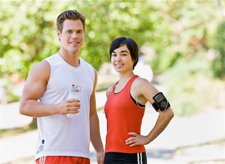 fitness asian couple - Runners drinking water Stock Photo - Budget Royalty-Free & Subscription, Code: 400-04167753