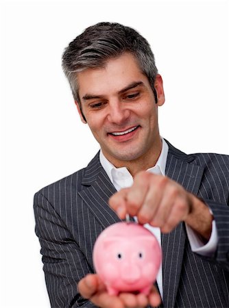 simsearch:400-04184165,k - Assertive Businessman saving money in a piggybank against a white background Stock Photo - Budget Royalty-Free & Subscription, Code: 400-04168030