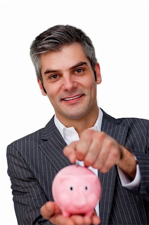 simsearch:400-04184165,k - Self-assured Businessman saving money in a piggybank against a white background Stock Photo - Budget Royalty-Free & Subscription, Code: 400-04168032