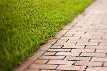 red trail - Selective focus shot of red brick walkway. Horizontal shot. Stock Photo - Budget Royalty-Free & Subscription, Code: 400-04168810