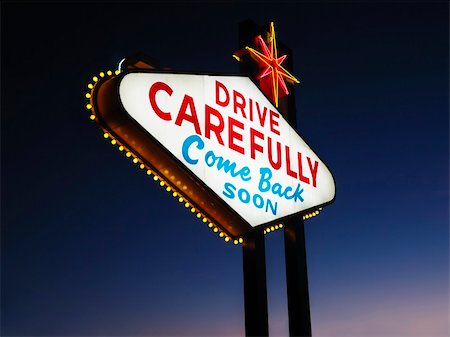 Las Vegas sign at night reading Drive carefully and Come back soon. Horizontally framed shot. Stock Photo - Budget Royalty-Free & Subscription, Code: 400-04169449