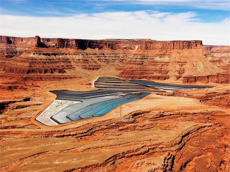 simsearch:400-03948680,k - Aerial view of an arid, craggy landscape surrounding tailing ponds. Horizontal shot. Stock Photo - Budget Royalty-Free & Subscription, Code: 400-04169689