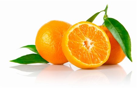 simsearch:400-05664137,k - fresh mandarin fruits with cut and green leaves isolated on white background Stock Photo - Budget Royalty-Free & Subscription, Code: 400-04160105