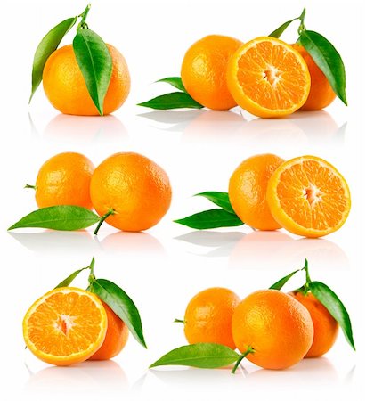 simsearch:400-05664137,k - set of fresh mandarine fruits with cut and green leaves isolated on white background Stock Photo - Budget Royalty-Free & Subscription, Code: 400-04160107