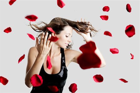 simsearch:400-04174787,k - Beautiful and sexy fashion model posing with rose petals Stock Photo - Budget Royalty-Free & Subscription, Code: 400-04174834