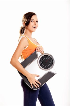 simsearch:400-04180657,k - Portrait of a beautiful athletic girl holding a scale, isolated on white Stock Photo - Budget Royalty-Free & Subscription, Code: 400-04178669