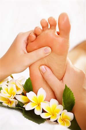 shiatsu - Exotic foot massage and spa foot treatment. Stock Photo - Budget Royalty-Free & Subscription, Code: 400-04179172