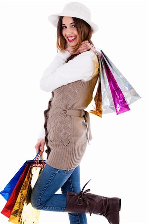 simsearch:400-04158321,k - young women enjoyed shopping and carrying her bags on a white background Stock Photo - Budget Royalty-Free & Subscription, Code: 400-04171466