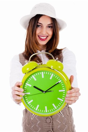 simsearch:400-04158321,k - Beautiful young model with hat and showing clock on isolated white background Stock Photo - Budget Royalty-Free & Subscription, Code: 400-04171469