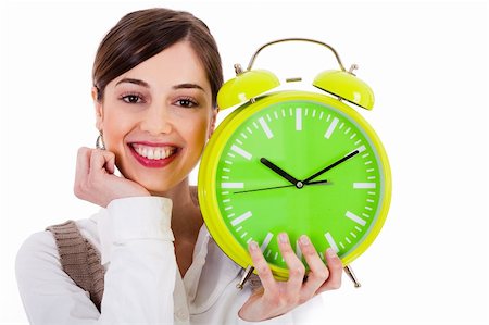 simsearch:400-04158321,k - attractive young model smiling and holding the clock on white background Stock Photo - Budget Royalty-Free & Subscription, Code: 400-04171470