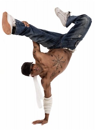 hip-hop dancer during his move session on isolated white background Stock Photo - Budget Royalty-Free & Subscription, Code: 400-04171480