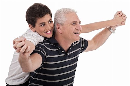 Piggyback ride given by grandfather on isolated background Photographie de stock - Aubaine LD & Abonnement, Code: 400-04171799