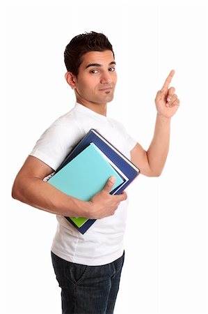 simsearch:400-04505681,k - A university or college student carrying some books and pointing to your message. Stock Photo - Budget Royalty-Free & Subscription, Code: 400-04172162