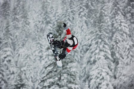 simsearch:400-03985663,k - young boys jumping in air ind showing trick with snowboard at winter season Stock Photo - Budget Royalty-Free & Subscription, Code: 400-04172842