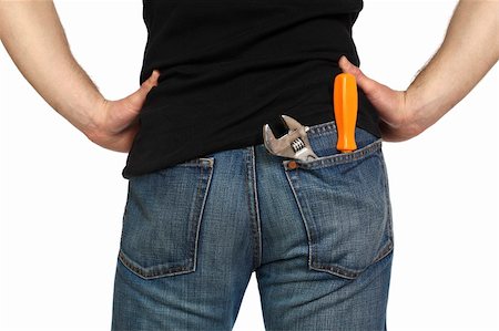 back view of young man with tools in his pocket Stock Photo - Budget Royalty-Free & Subscription, Code: 400-04173693