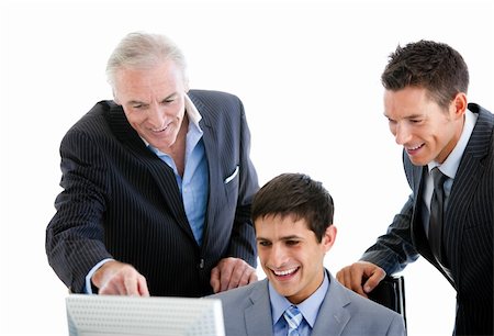simsearch:400-04184165,k - Self-assured businessmen working at a computer in the office Stock Photo - Budget Royalty-Free & Subscription, Code: 400-04184160