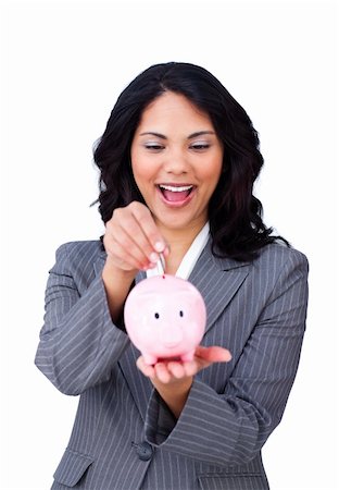 simsearch:400-04184165,k - Happy ethnic businesswoman saving money in a piggybank isolated on a white background Stock Photo - Budget Royalty-Free & Subscription, Code: 400-04184196