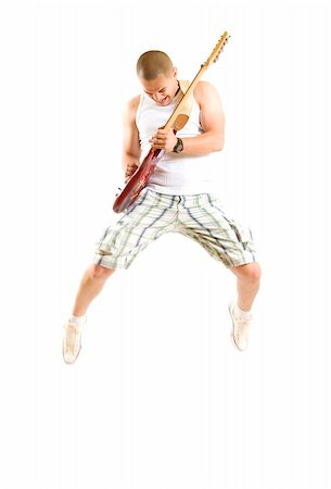 simsearch:400-04863651,k - passionate guitarist jumps in the air over white Stock Photo - Budget Royalty-Free & Subscription, Code: 400-04184943