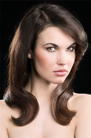 simsearch:400-04230083,k - cute and young brunette in a beauty shot with hair stylish looking in camera Stock Photo - Budget Royalty-Free & Subscription, Code: 400-04185399