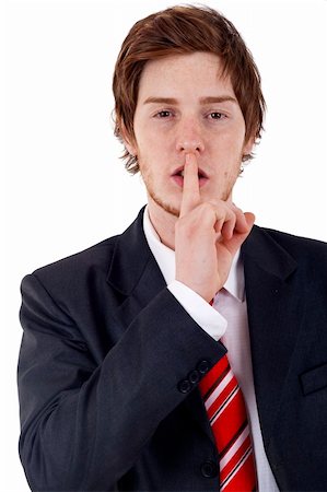 simsearch:400-04175955,k - Portrait of businessman showing silence gesture with his forefinger by mouth Stock Photo - Budget Royalty-Free & Subscription, Code: 400-04185593