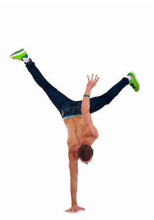 stylish and cool breakdance style dancer posing on white, standing on one hand Stock Photo - Budget Royalty-Free & Subscription, Code: 400-04185618