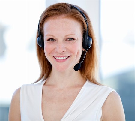 simsearch:400-05287143,k - Caucasian sales representative woman with an headset against white background Stock Photo - Budget Royalty-Free & Subscription, Code: 400-04185741