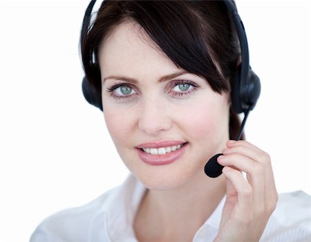 simsearch:400-05287143,k - Radiant sales representative woman with an headset against white background Stock Photo - Budget Royalty-Free & Subscription, Code: 400-04185755