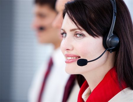 simsearch:400-05287143,k - Concentrated sales representative team with an headset in the office Stock Photo - Budget Royalty-Free & Subscription, Code: 400-04185759