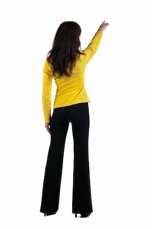 simsearch:400-04586134,k - Young woman points at wall. Stock Photo - Budget Royalty-Free & Subscription, Code: 400-04186790
