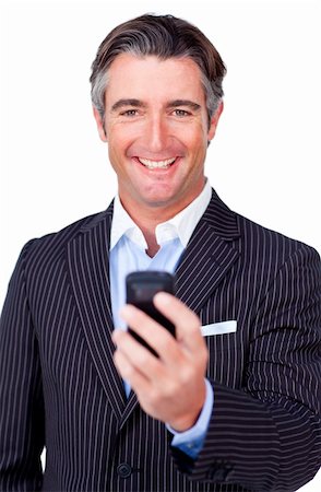 simsearch:400-05145011,k - Happy businessman sending a text against a white background Stock Photo - Budget Royalty-Free & Subscription, Code: 400-04187153