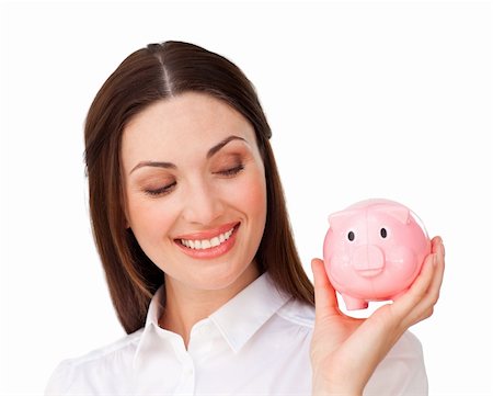 simsearch:400-05715208,k - Confident businesswoman holding a piggybank isolated on a white background Stock Photo - Budget Royalty-Free & Subscription, Code: 400-04187475